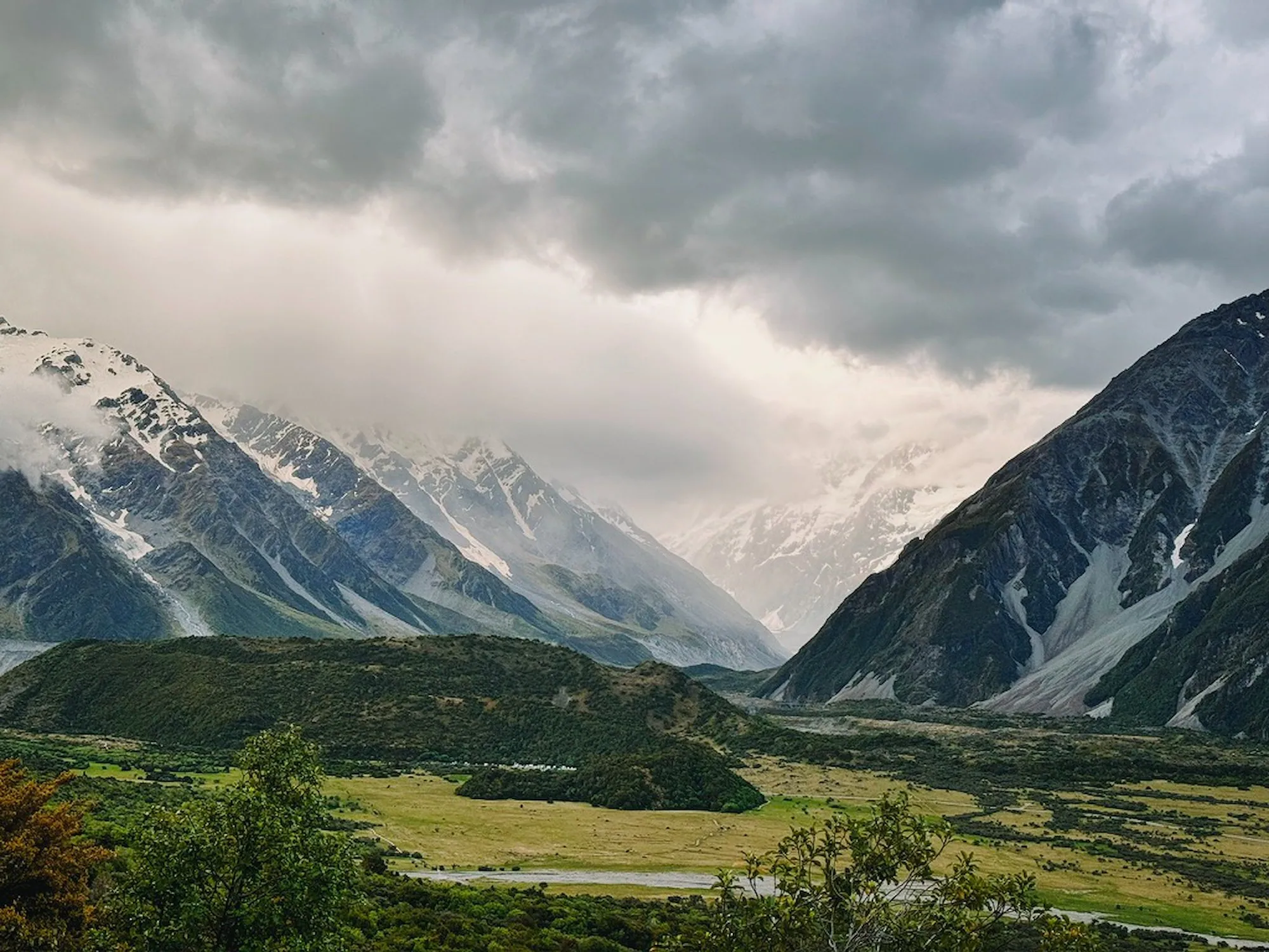 Dramatic clouds filling the Hooker Valley above Mount Cook Village
