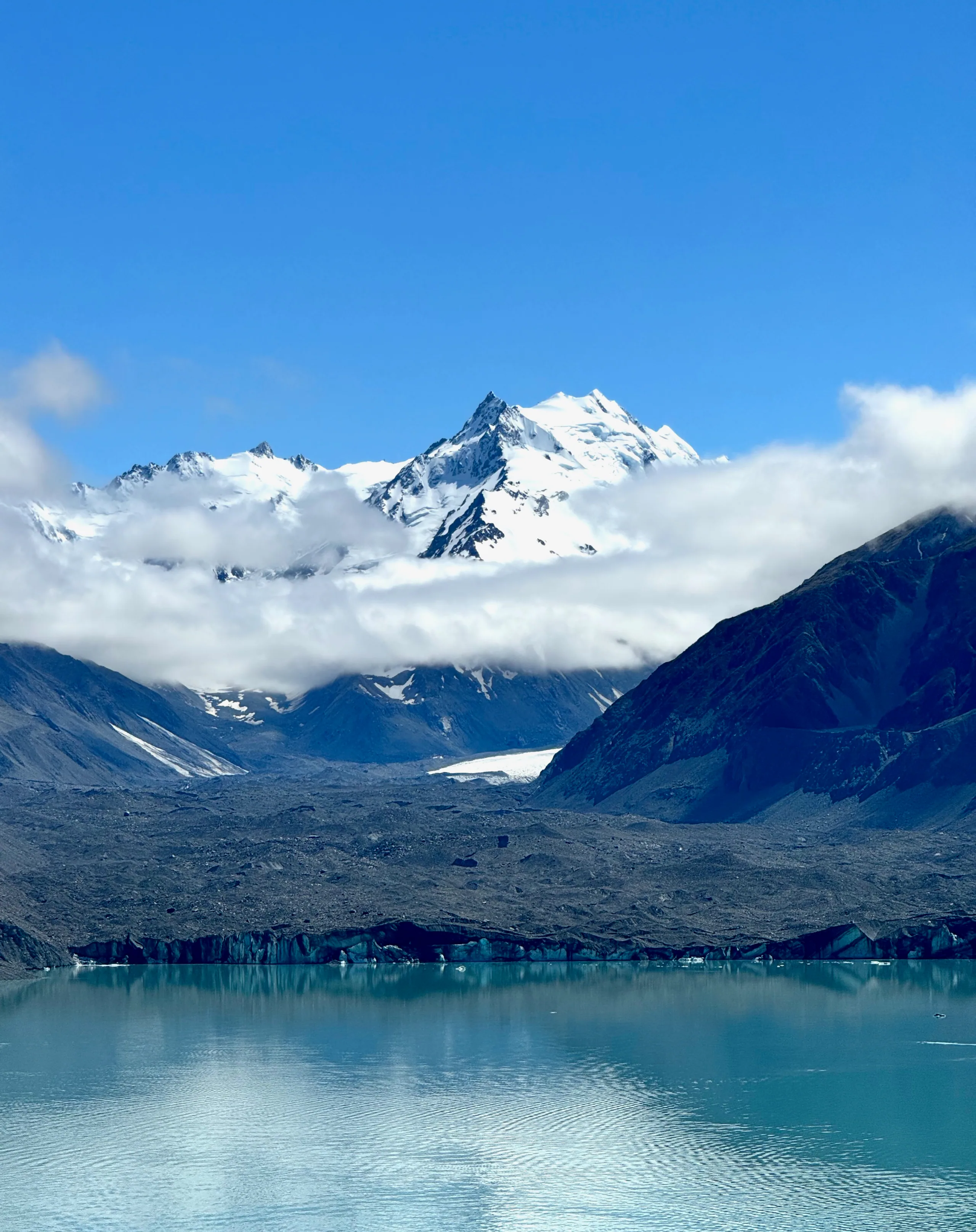 Aoraki / Mount Cook rising above the turquoise Tasman Glacier Lake