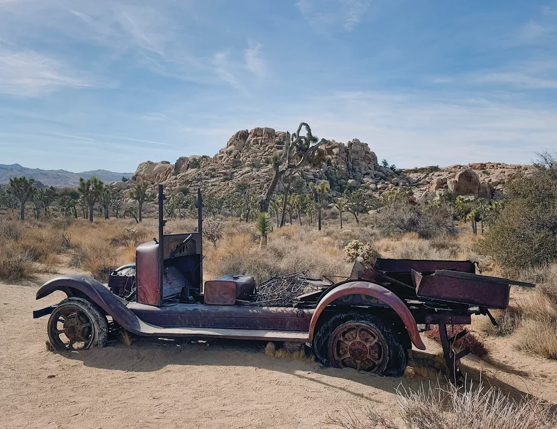 An abandoned car near Wall Street Mill
