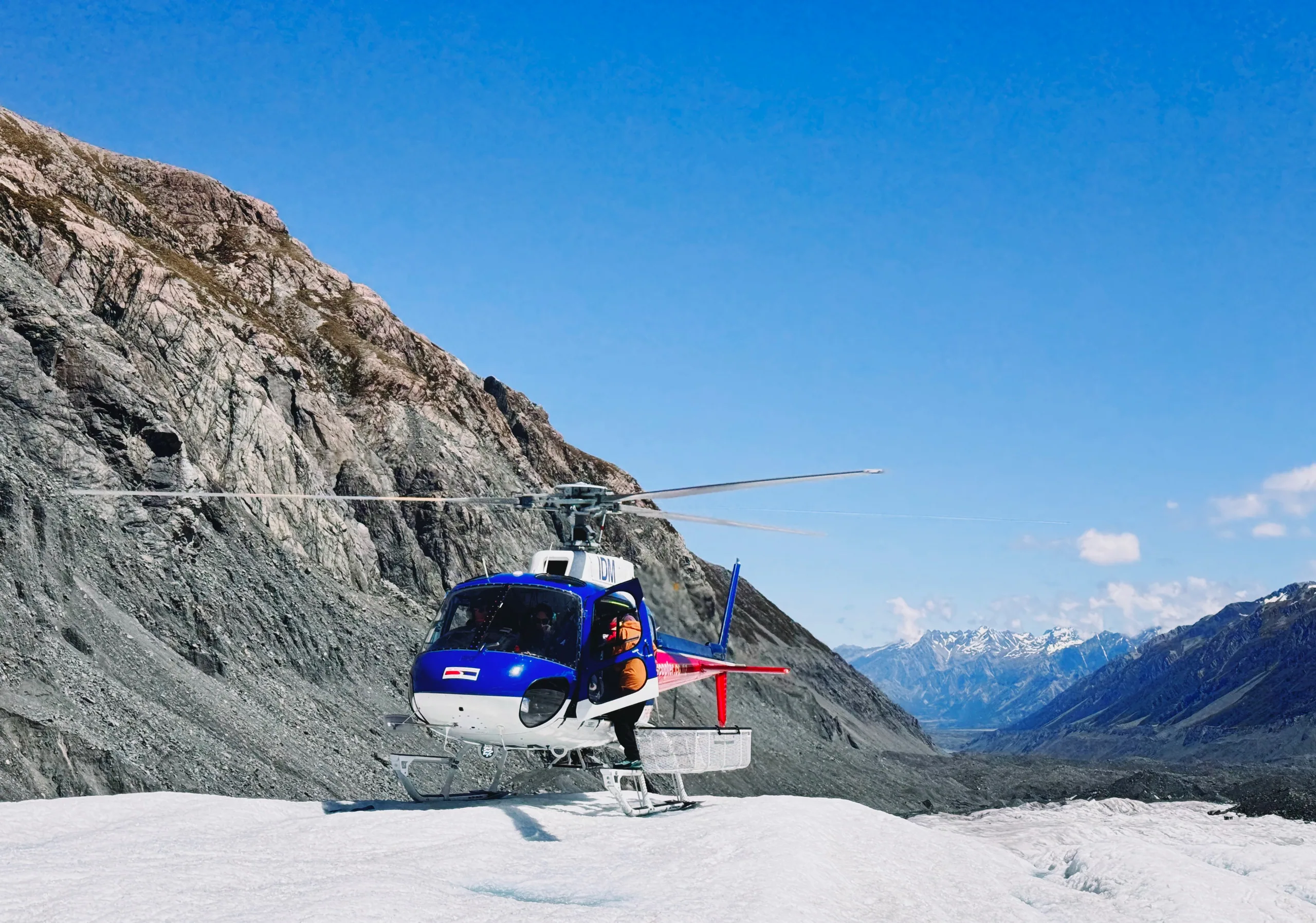 A helicopter preparing to depart from the Tasman Glacier