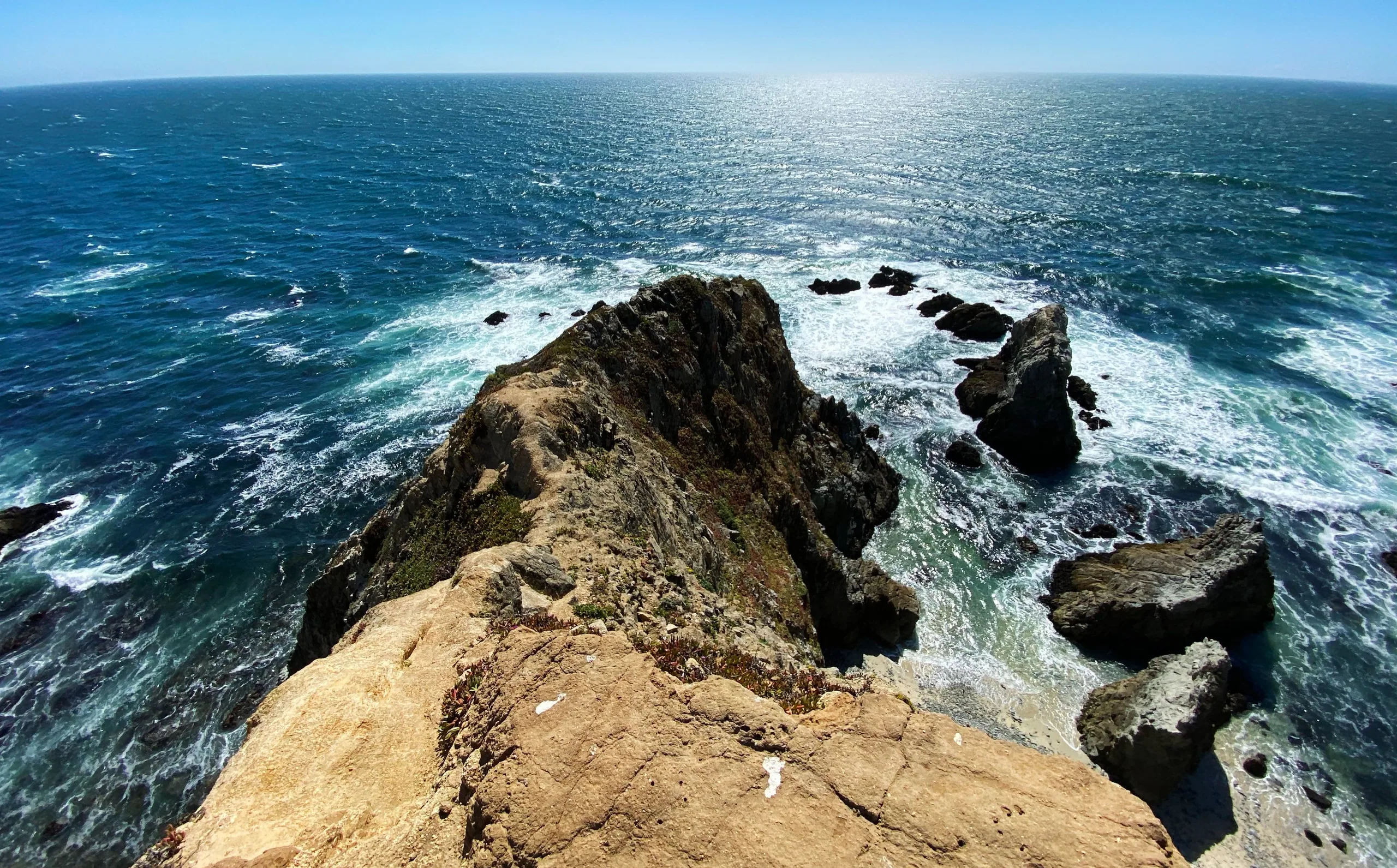 The narrow tip of Tomales Point surrounded by churning Pacific water